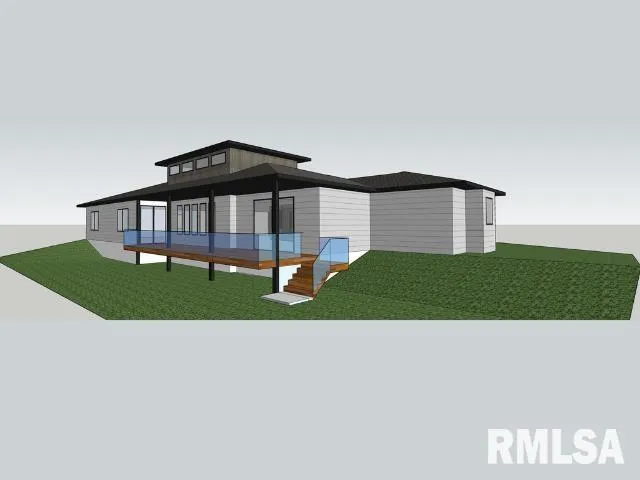 a black and white building with a yard