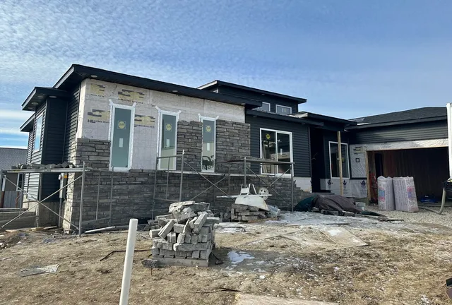 a front view of a house with patio