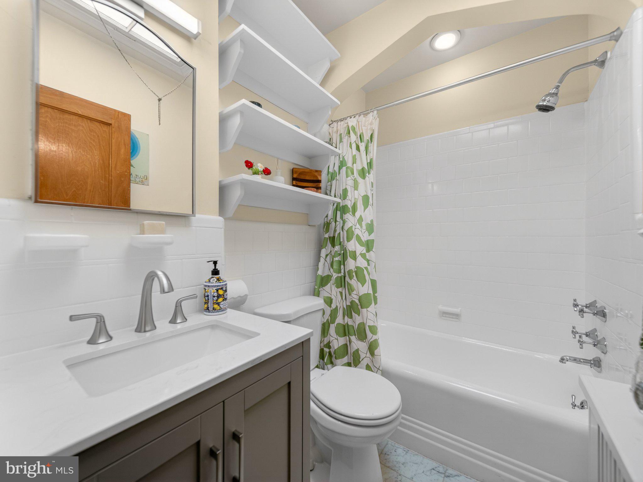 2119 Huidekoper Place Northwest Washington, DC 20007 - Photo 17 of 37 Charming bathroom with modern touches.