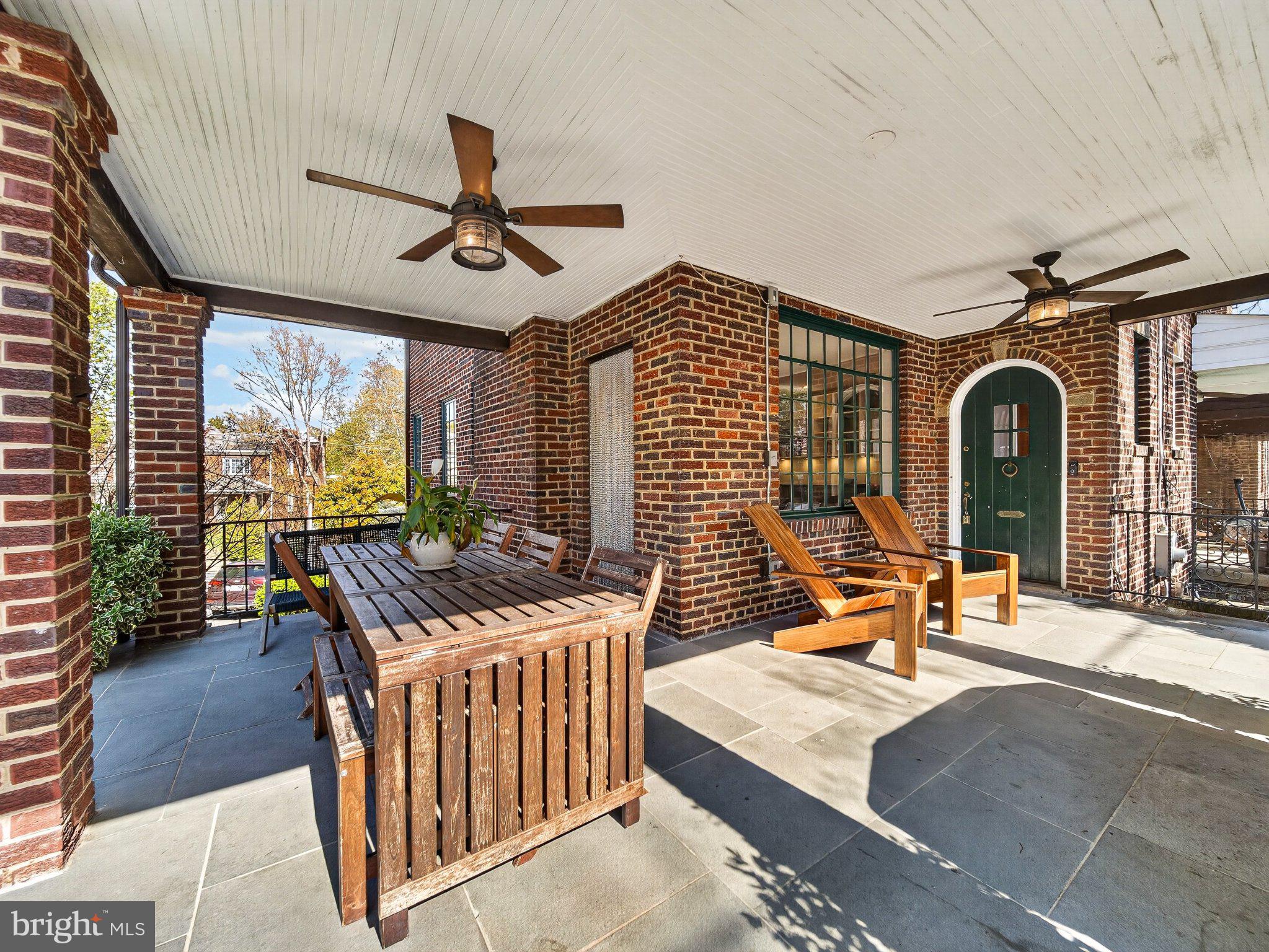 2119 Huidekoper Place Northwest Washington, DC 20007 - Photo 2 of 37 Charming patio with rustic elegance.