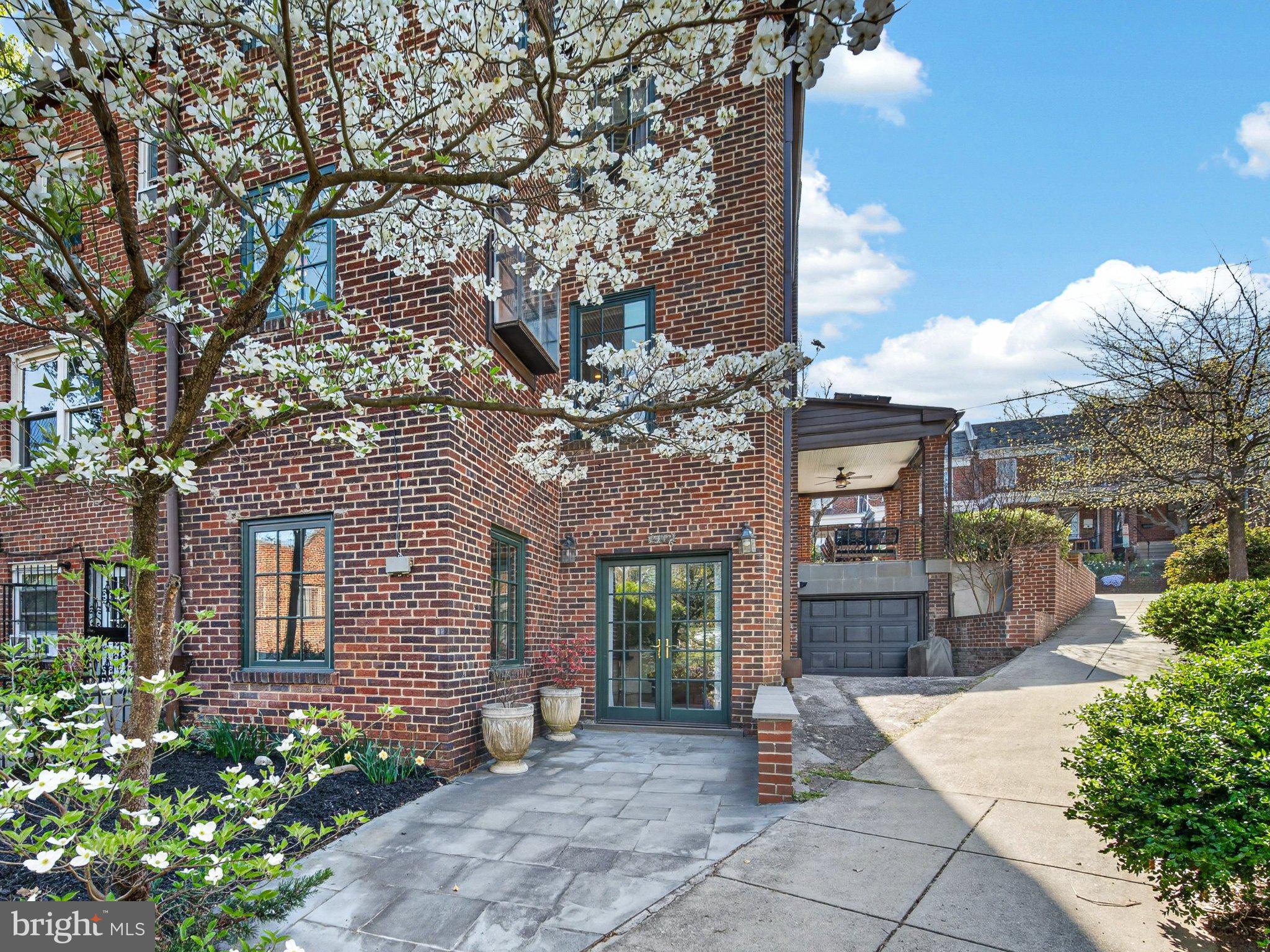 2119 Huidekoper Place Northwest Washington, DC 20007 - Photo 24 of 37 Charming brick home with blooming trees.