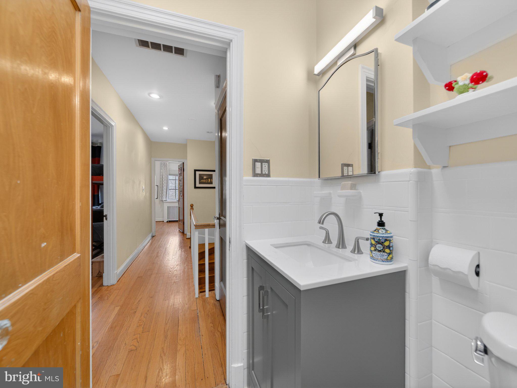 2119 Huidekoper Place Northwest Washington, DC 20007 - Photo 26 of 37 Charming bathroom with modern touches.