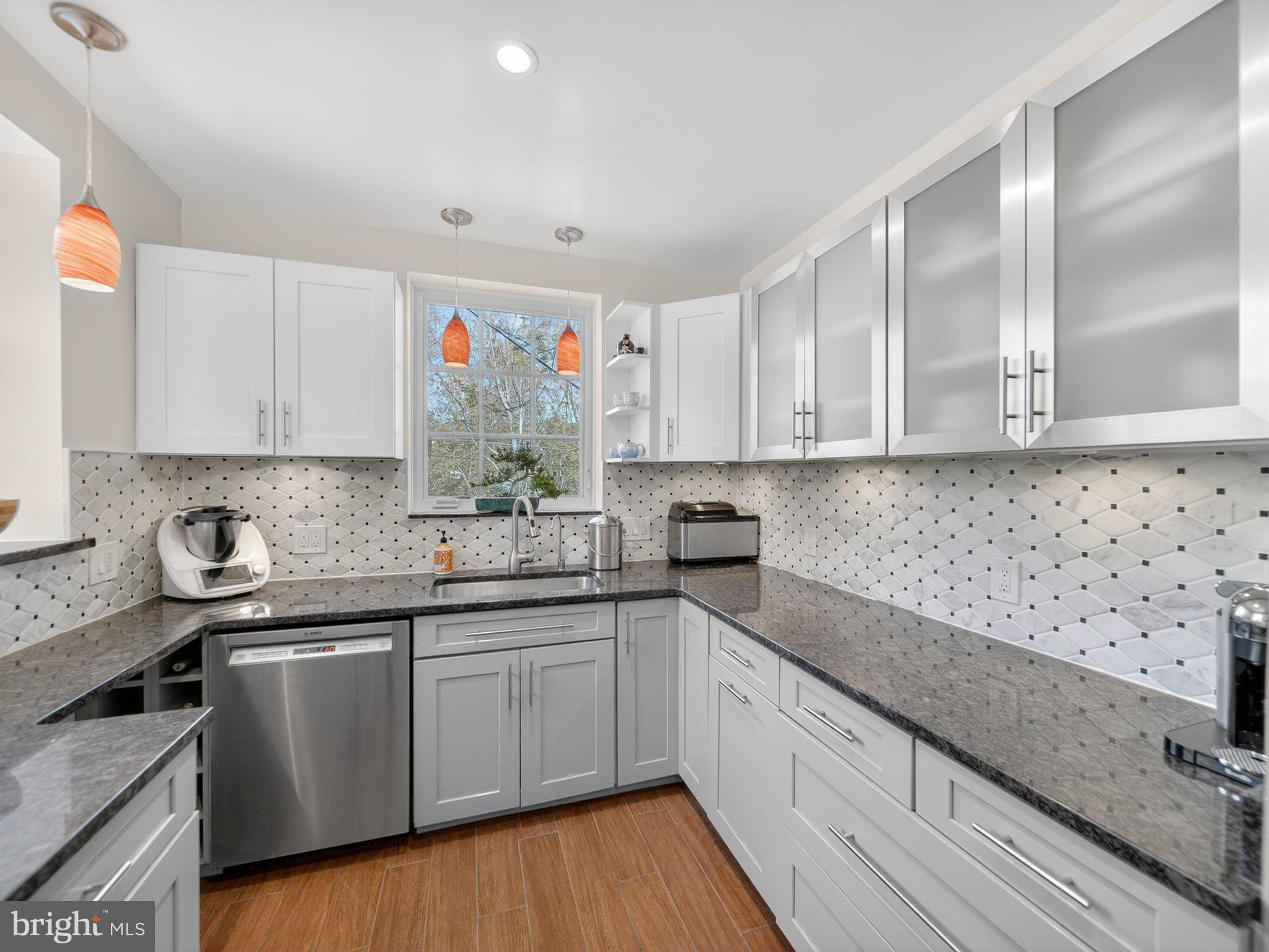 2119 Huidekoper Place Northwest Washington, DC 20007 - Photo 7 of 37 Modern kitchen with sleek finishes.
