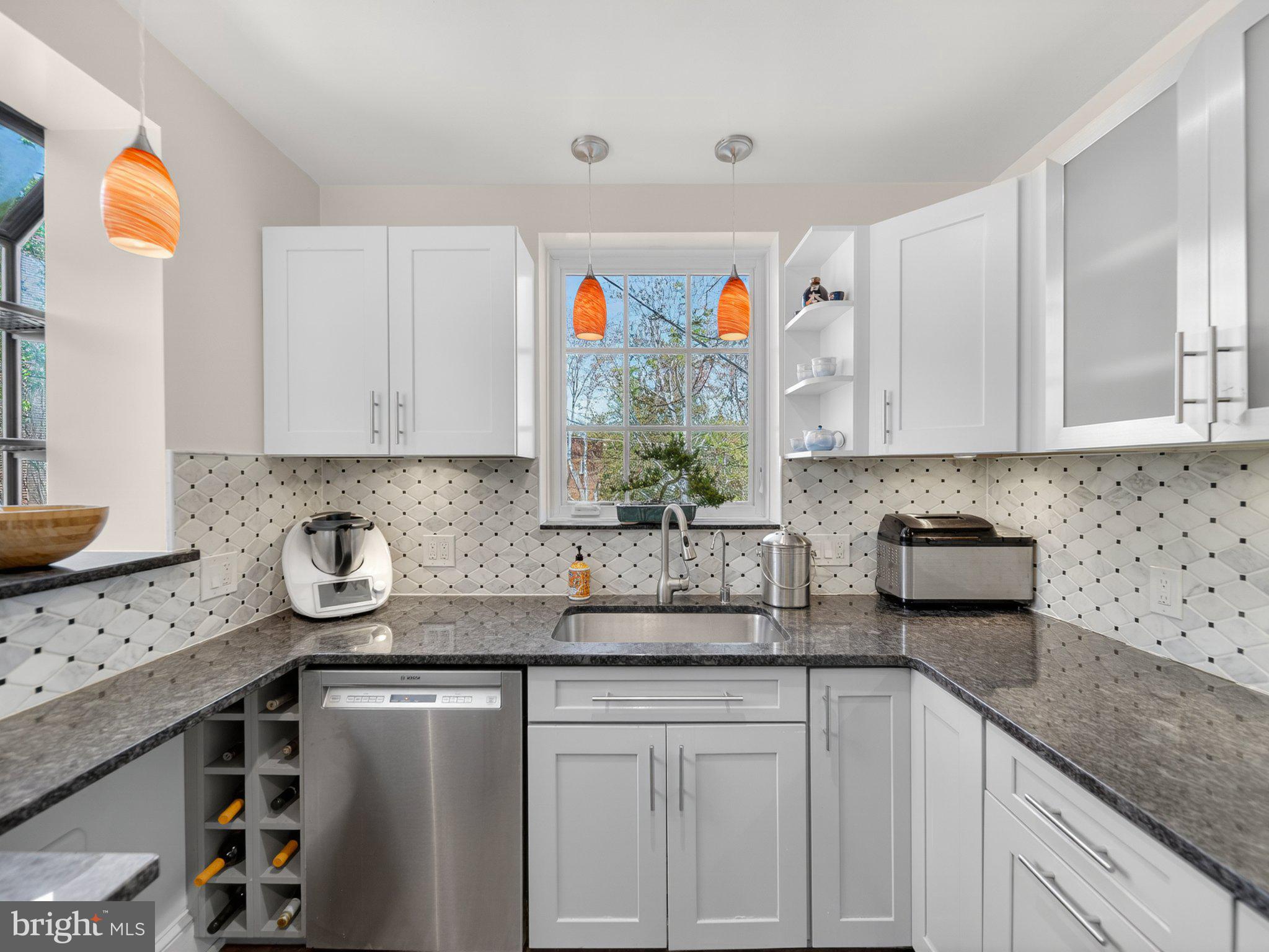 2119 Huidekoper Place Northwest Washington, DC 20007 - Photo 9 of 37 Modern kitchen with bright accents.