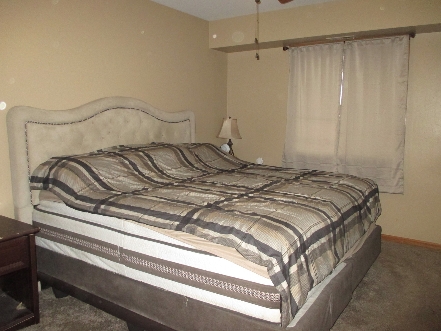 4010 150th Street, Unit 10 Midlothian, IL 60445 - Photo 6 of 13 a bedroom with a bed and a ceiling fan