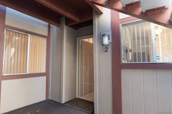 a view of an entryway with a front door