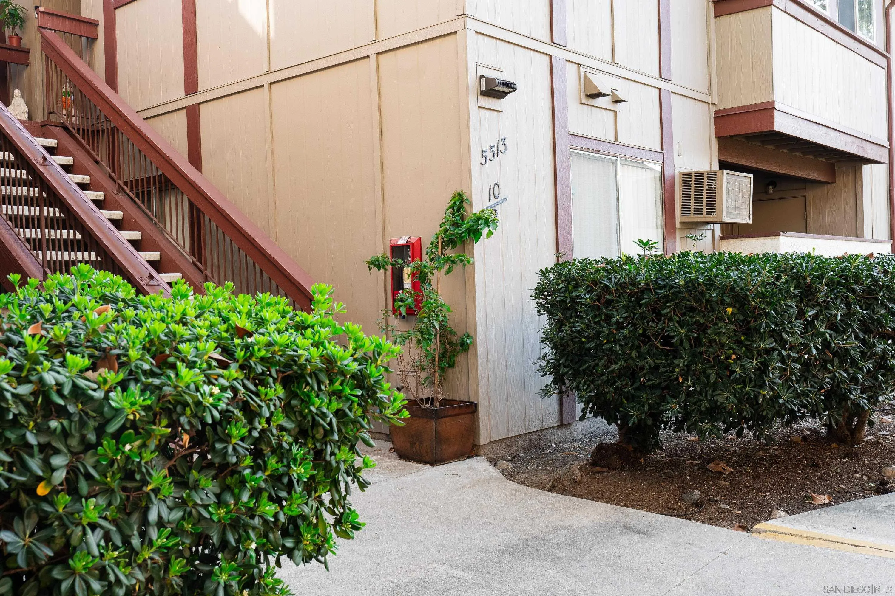 5513 Adobe Falls Road, Unit 2 San Diego, CA 92120 - Photo 39 of 40 a view of a potted plants in front of building