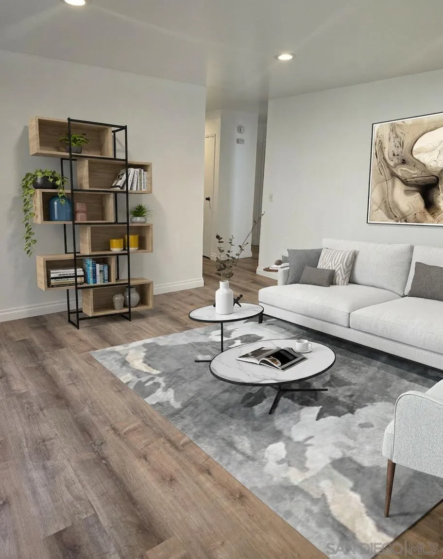5513 Adobe Falls Road, Unit 2 San Diego, CA 92120 - Photo 4 of 40 a living room with furniture and a wooden floor