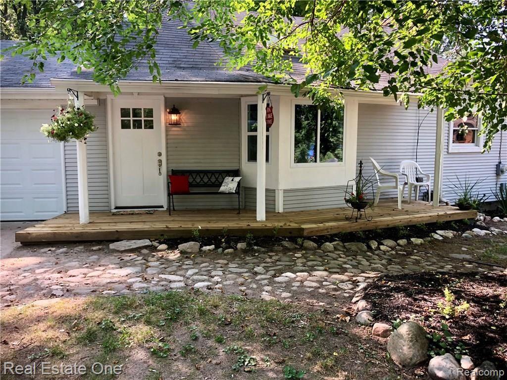 5222 Woodlane Road Clarkston, MI 48348 - Photo 2 of 50 New porch to entrance of home gives great curb appeal