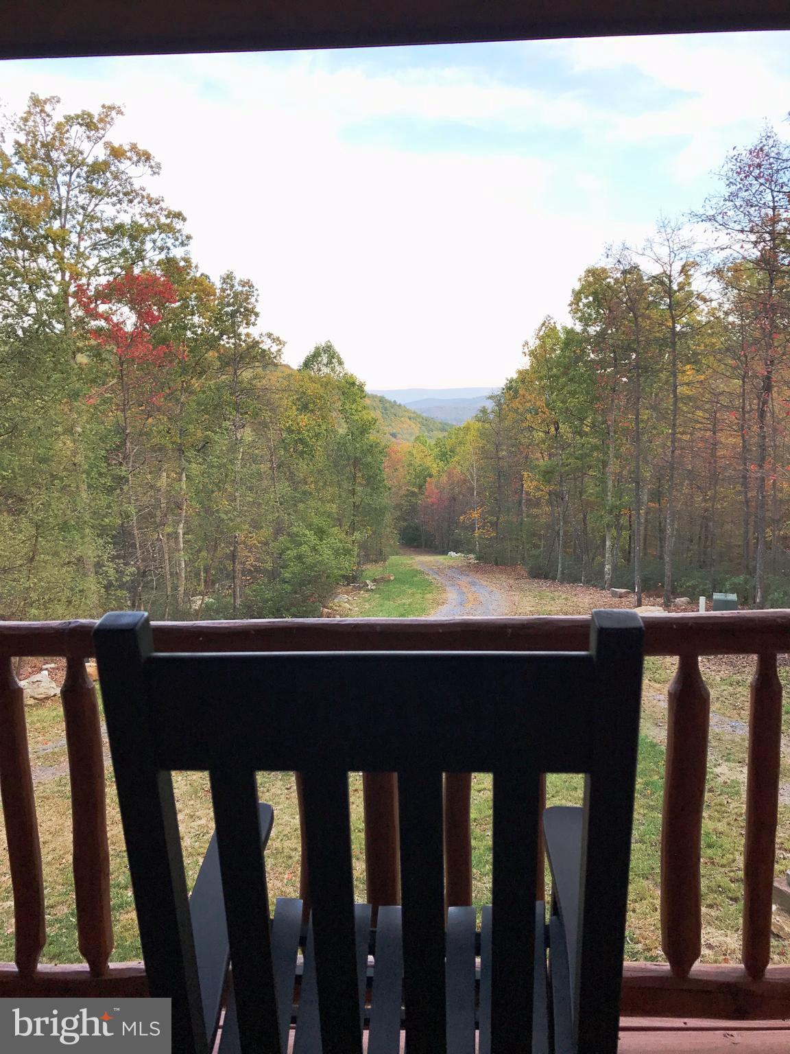 9210 Crooked Run Road Basye, VA 22810 - Photo 4 of 29 a view of a wooden fence and floor from a balcony