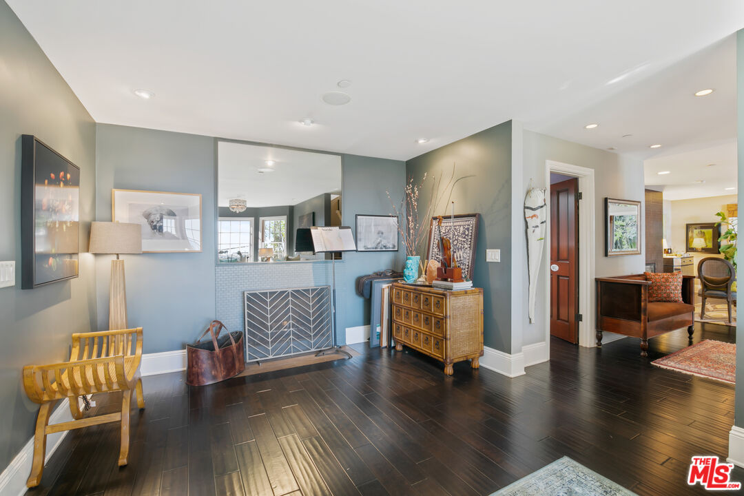 2962 Valmere Drive Malibu, CA 90265 - Photo 13 of 50 a living room with furniture and wooden floor
