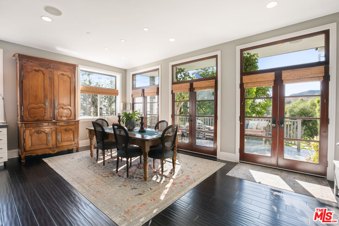 2962 Valmere Drive Malibu, CA 90265 - Photo 3 of 50 a view of a dining room with furniture window and wooden floor