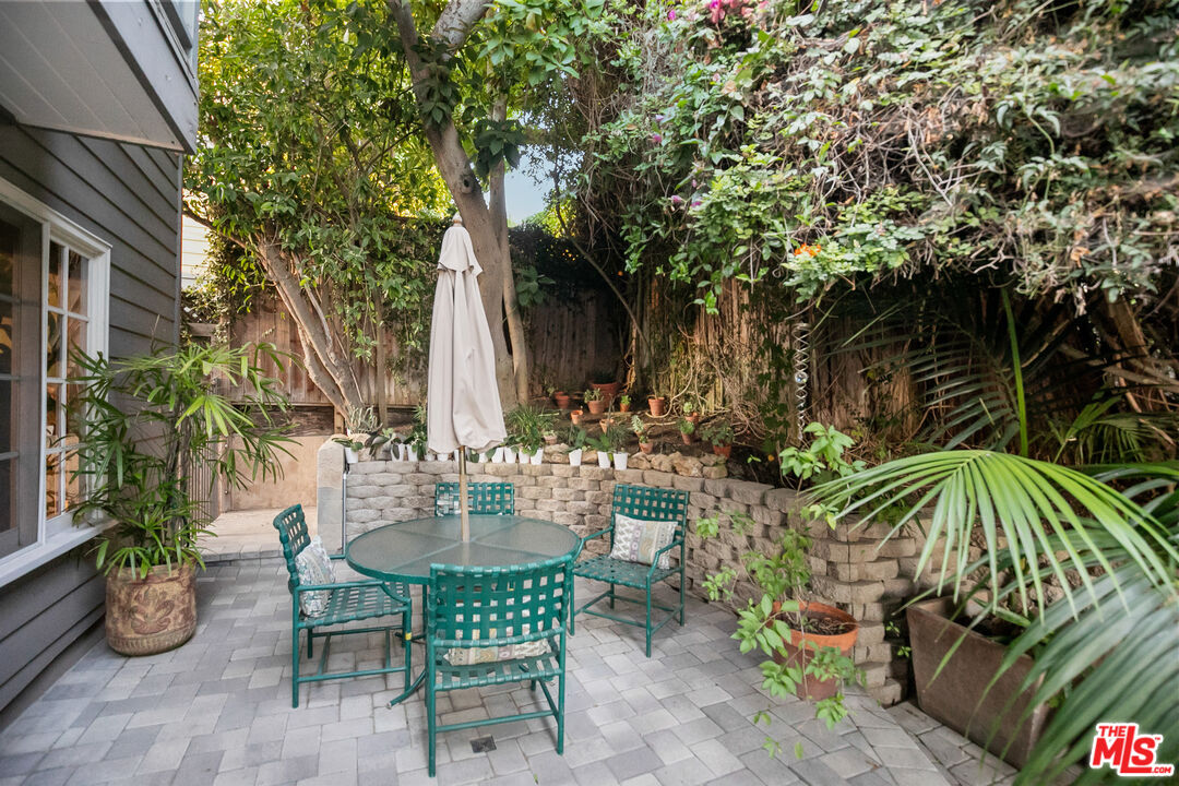 2962 Valmere Drive Malibu, CA 90265 - Photo 42 of 50 a view of backyard with outdoor seating and plants