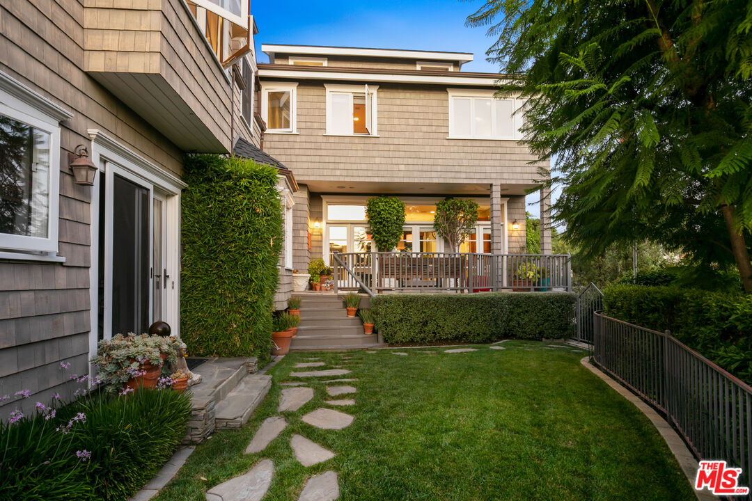 2962 Valmere Drive Malibu, CA 90265 - Photo 44 of 50 a front view of a house with a yard