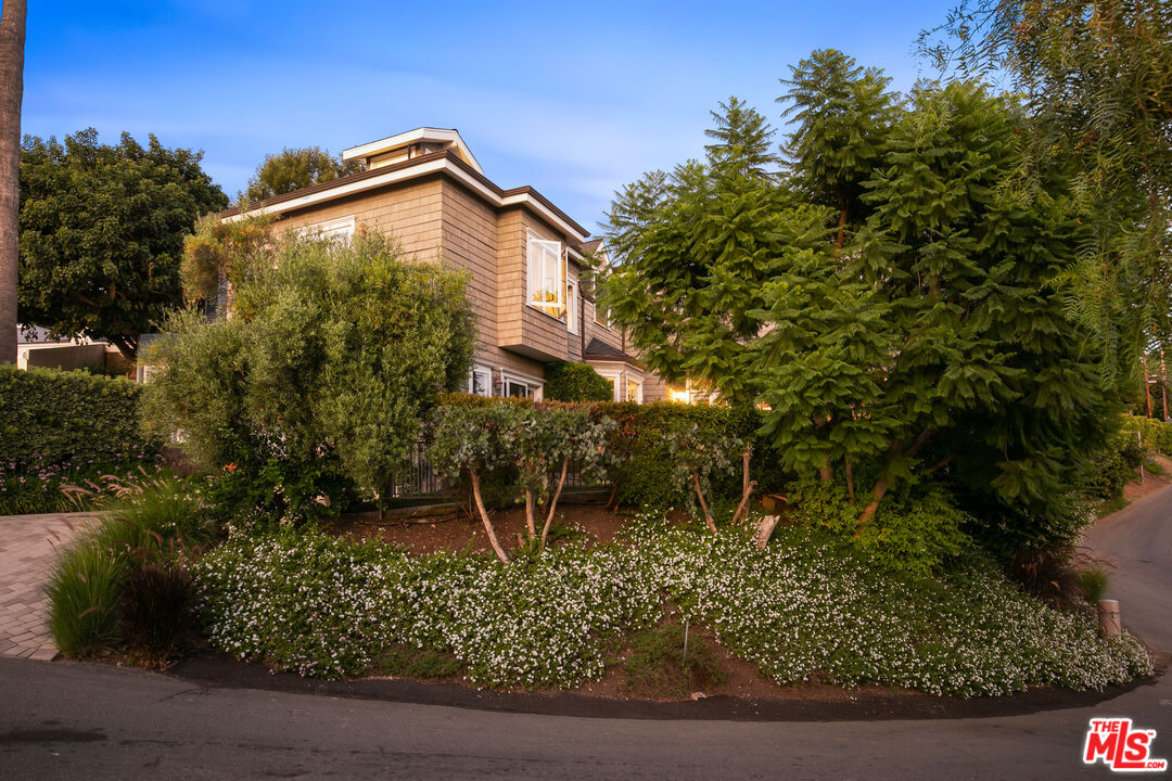 2962 Valmere Drive Malibu, CA 90265 - Photo 46 of 50 a front view of a house with a yard