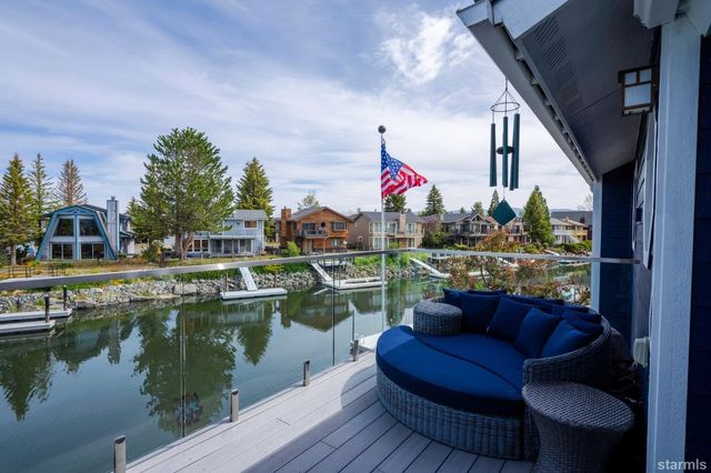 a view of sitting area and lake view