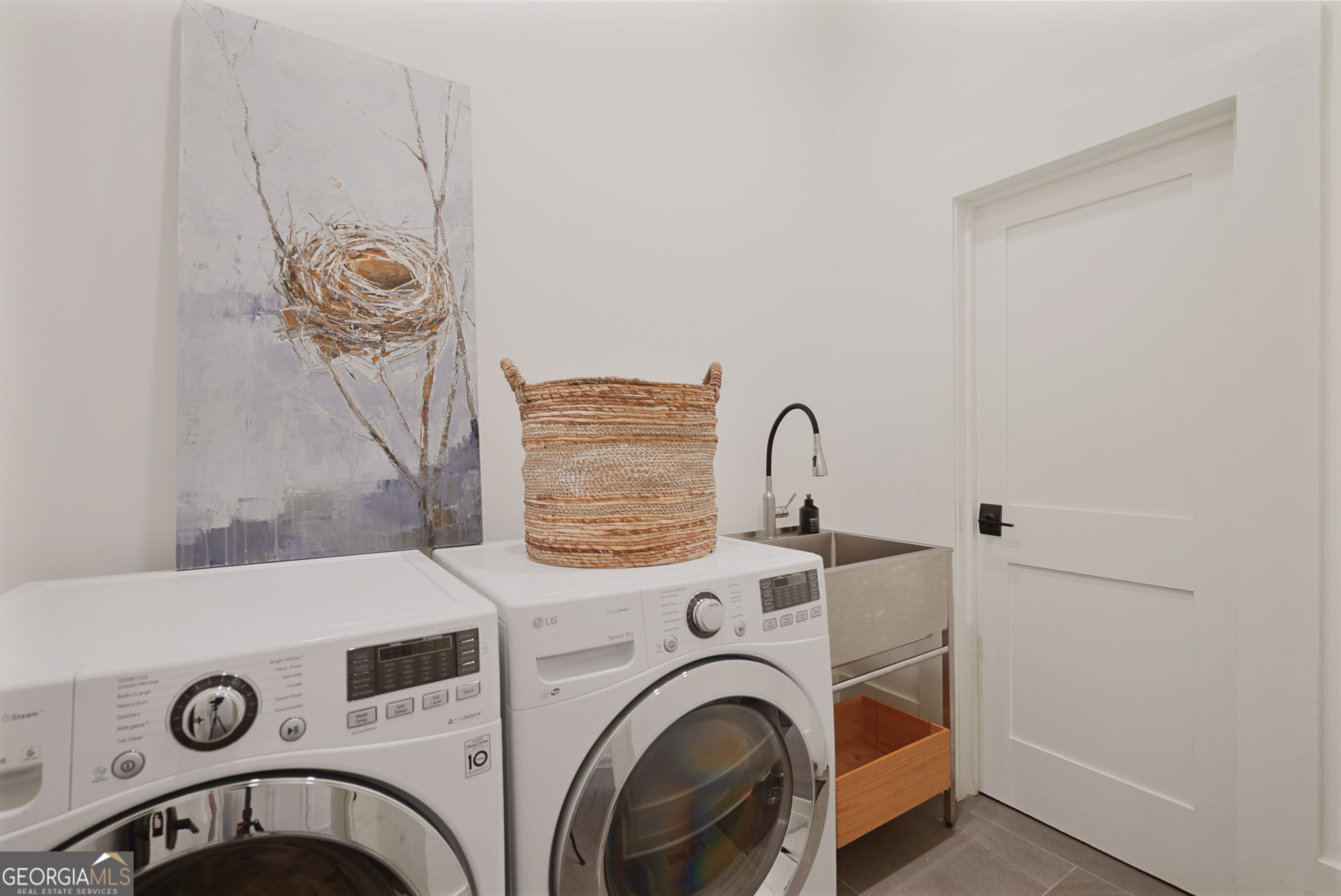 235 Glades Road Eatonton, GA 31024 - Photo 22 of 79 a utility room with dryer and washer