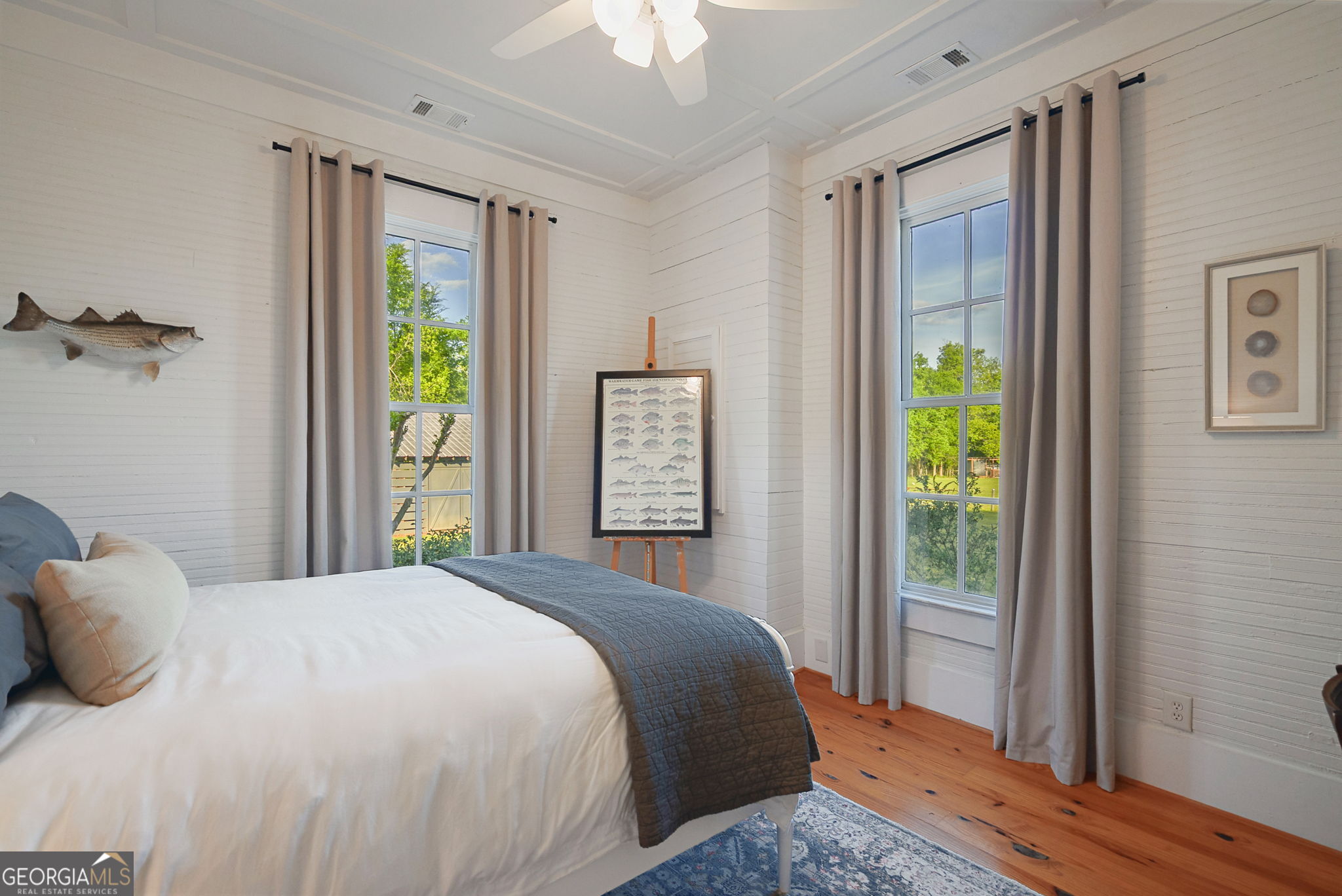 235 Glades Road Eatonton, GA 31024 - Photo 35 of 79 a bedroom with a bed and a window