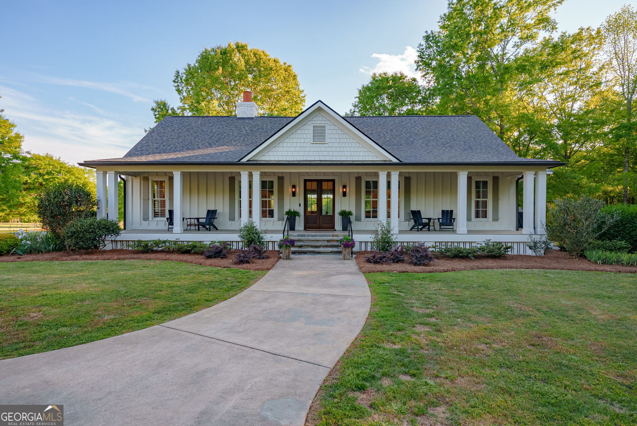 235 Glades Road Eatonton, GA 31024 - Photo 61 of 79 a front view of a house with a yard