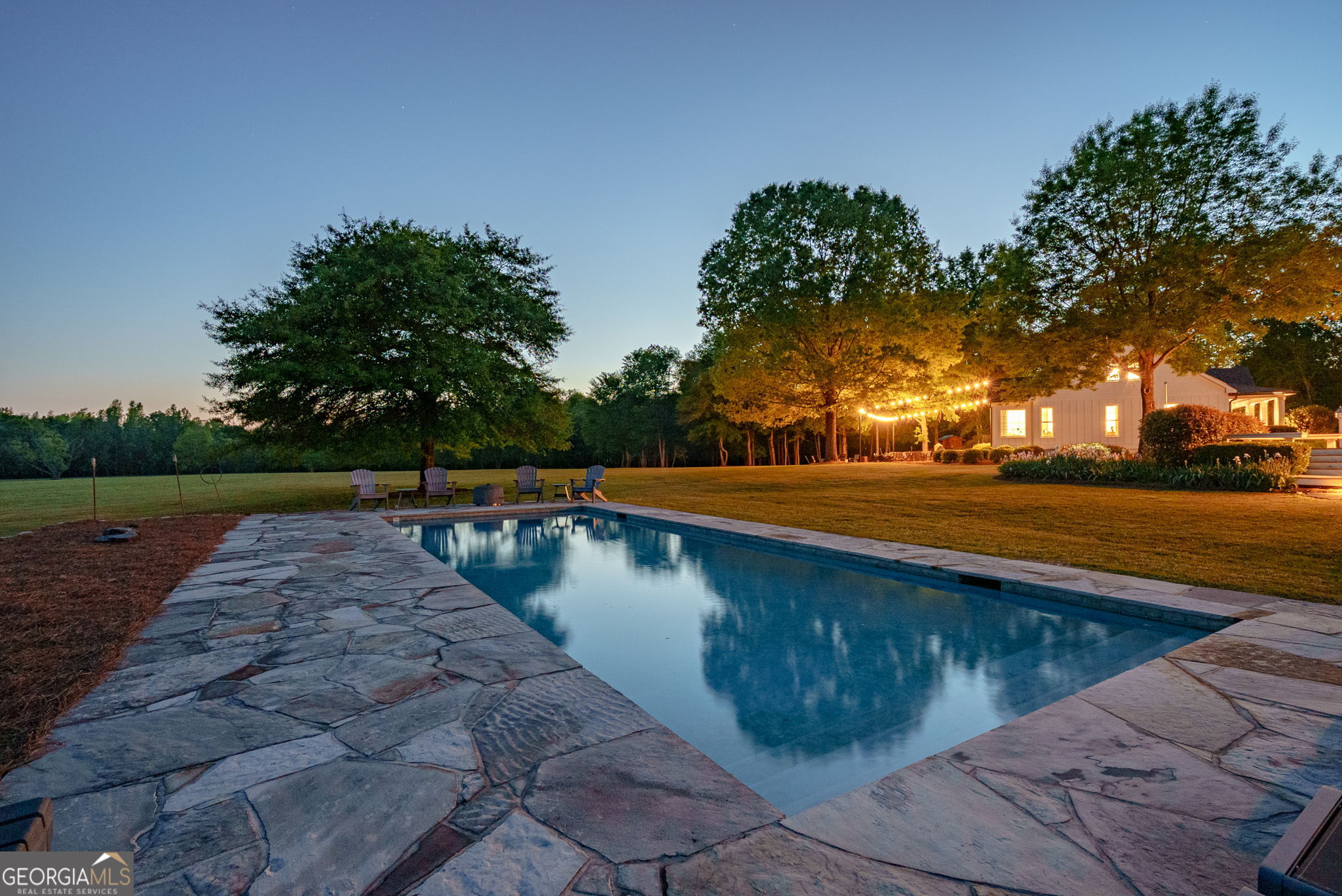 235 Glades Road Eatonton, GA 31024 - Photo 7 of 79 a view of swimming pool with a yard