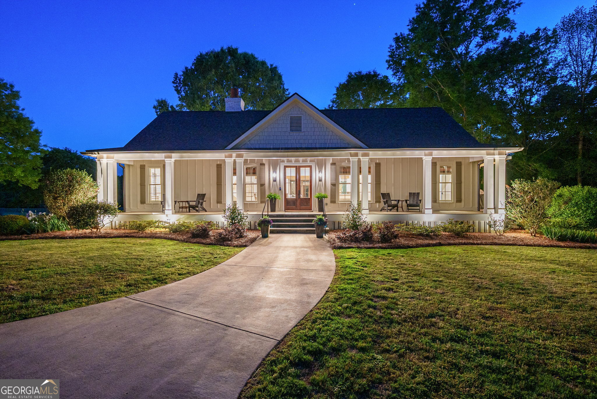 235 Glades Road Eatonton, GA 31024 - Photo 9 of 79 a front view of a house with garden