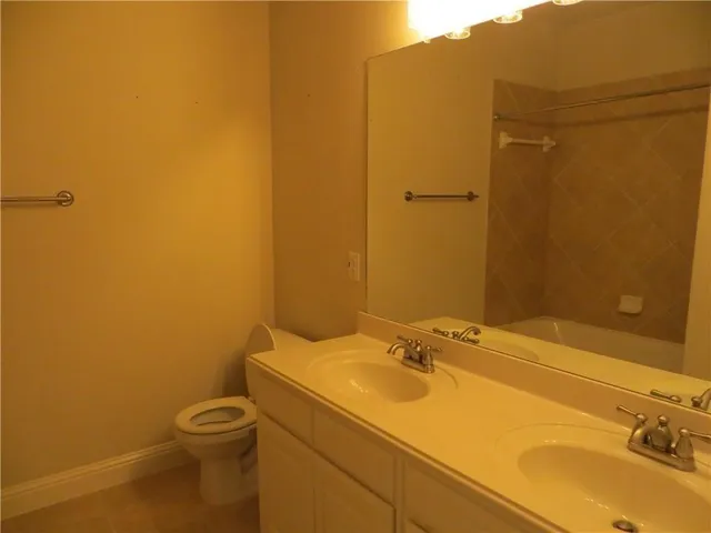 a bathroom with a sink and a toilet