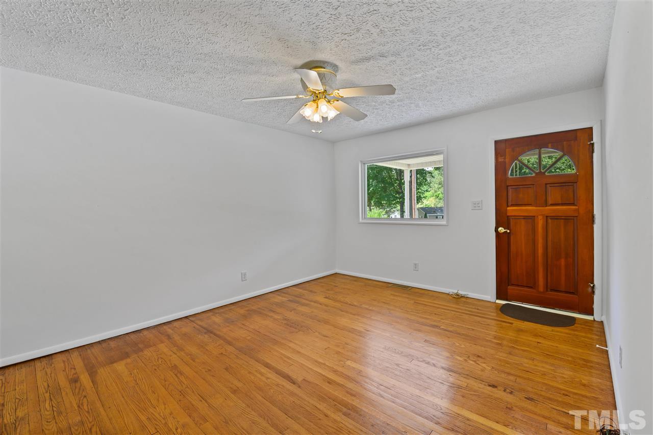 1421 Kelly Road Garner, NC 27529 - Photo 16 of 24 Fresh Paint! Hardwood Floors welcome you into your new home.