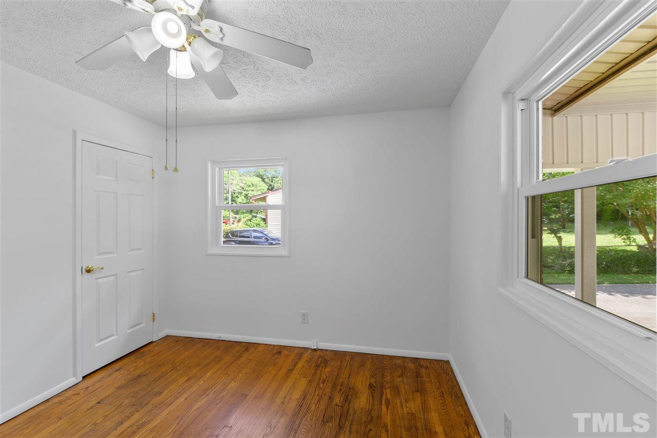 1421 Kelly Road Garner, NC 27529 - Photo 22 of 24 Hardwood floors extend to all the bedrooms! Windows allow for cross ventilation!