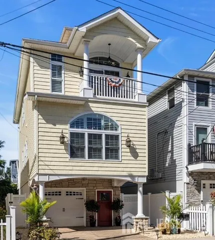 a front view of a house with a balcony