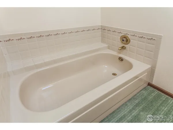 a bathroom with a bathtub