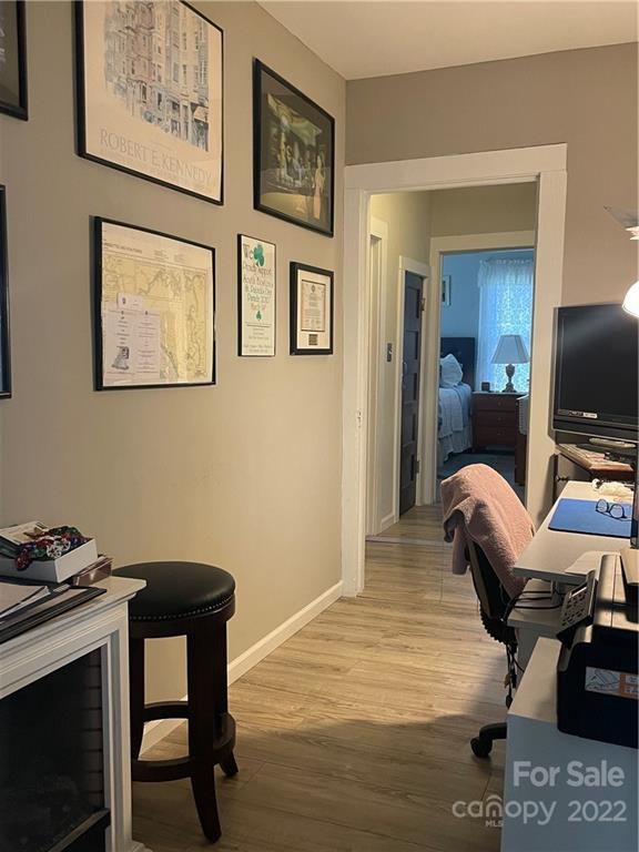 170 South Mitchell Avenue Rutherfordton, NC 28139 - Photo 12 of 21 a workspace with furniture and wooden floor