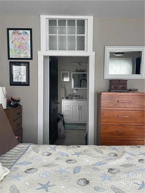 170 South Mitchell Avenue Rutherfordton, NC 28139 - Photo 15 of 21 a bedroom with a bed and a dresser in it