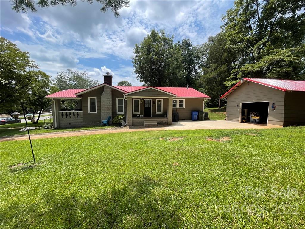 170 South Mitchell Avenue Rutherfordton, NC 28139 - Photo 18 of 21 a view of a house with a yard porch and sitting area