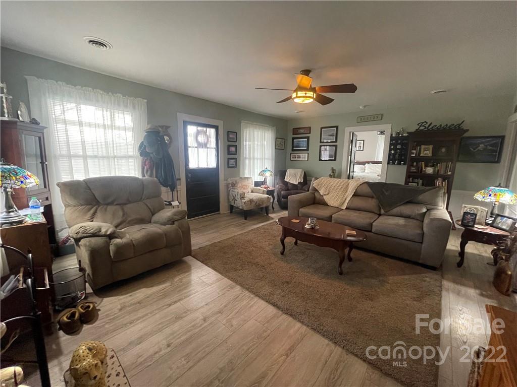 170 South Mitchell Avenue Rutherfordton, NC 28139 - Photo 2 of 21 a living room with furniture and a large window