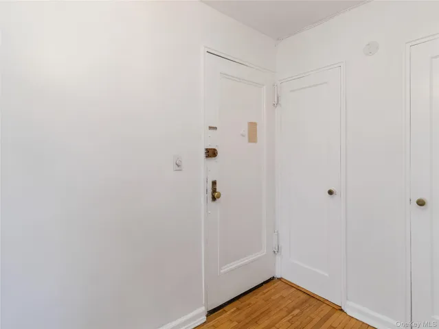 a view of a livingroom with wooden floor