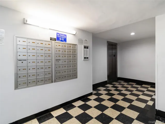 a picture of a bathroom with a glass door