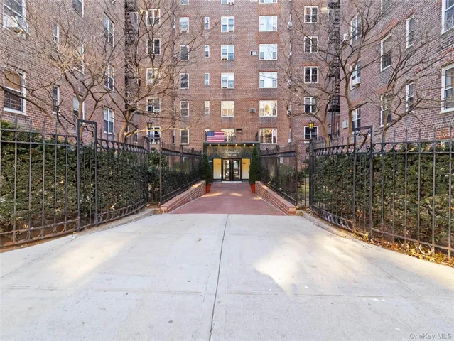 a view of front door and small yard