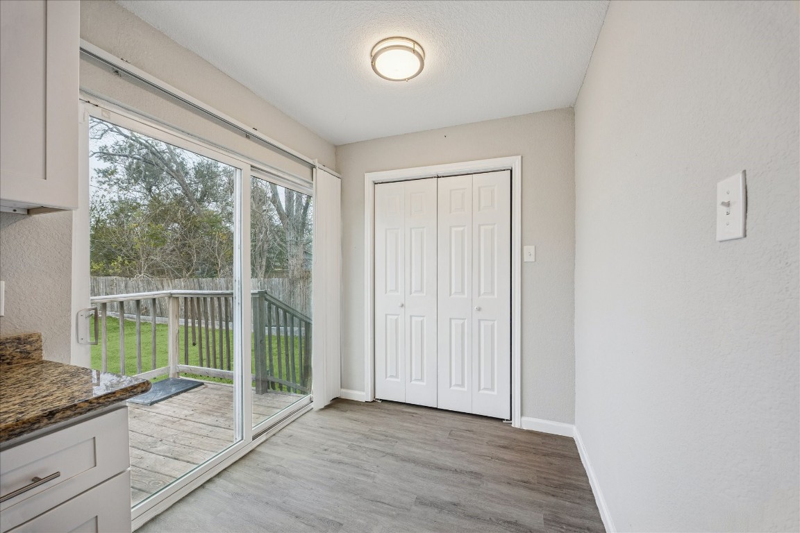 5126 Higgins Street Houston, TX 77033 - Photo 4 of 14 a view of entryway with wooden floor