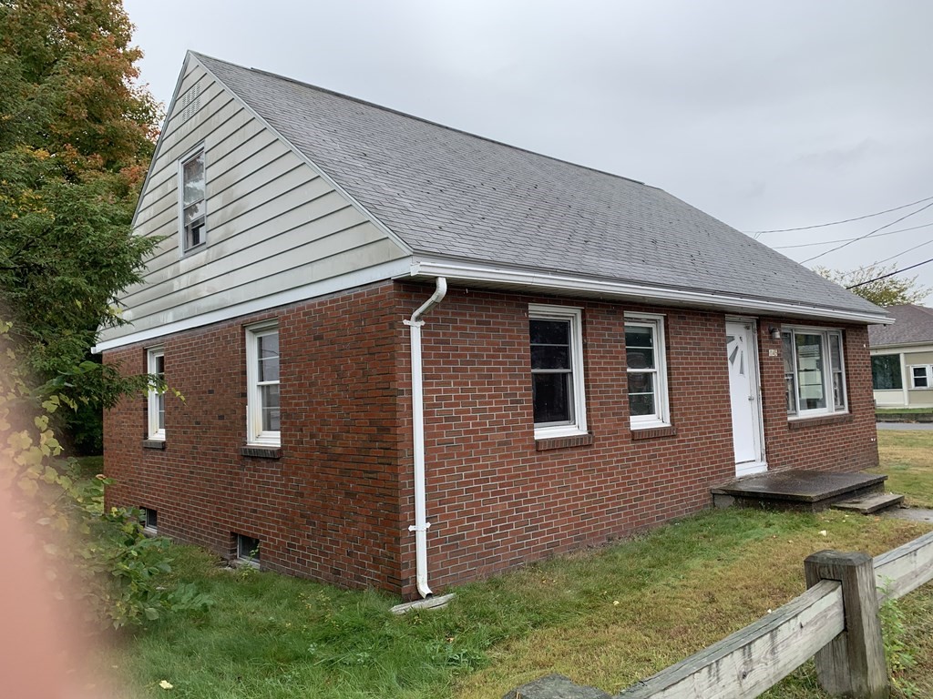 1145 Boston Road Springfield, MA 01119 - Photo 1 of 19 front view of a house with a yard