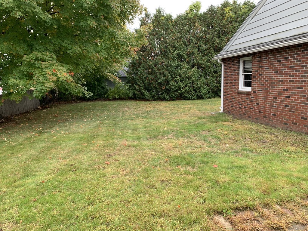 1145 Boston Road Springfield, MA 01119 - Photo 4 of 19 a view of a house with a yard