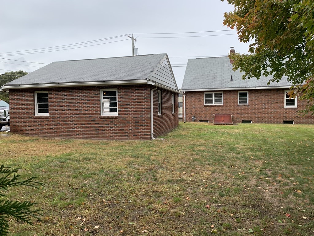 1145 Boston Road Springfield, MA 01119 - Photo 5 of 19 a front view of a house with yard