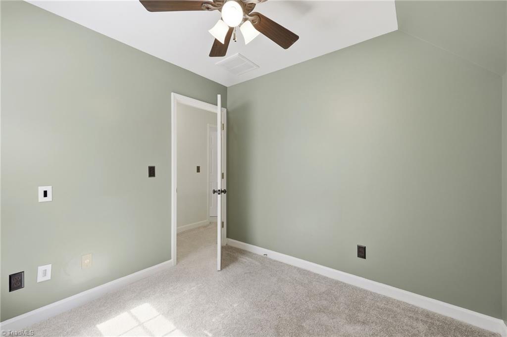 8861 Boylston Road Colfax, NC 27235 - Photo 33 of 50 A versatile flex room is ideal as a home office, nursery, craft room, or quiet reading retreat.