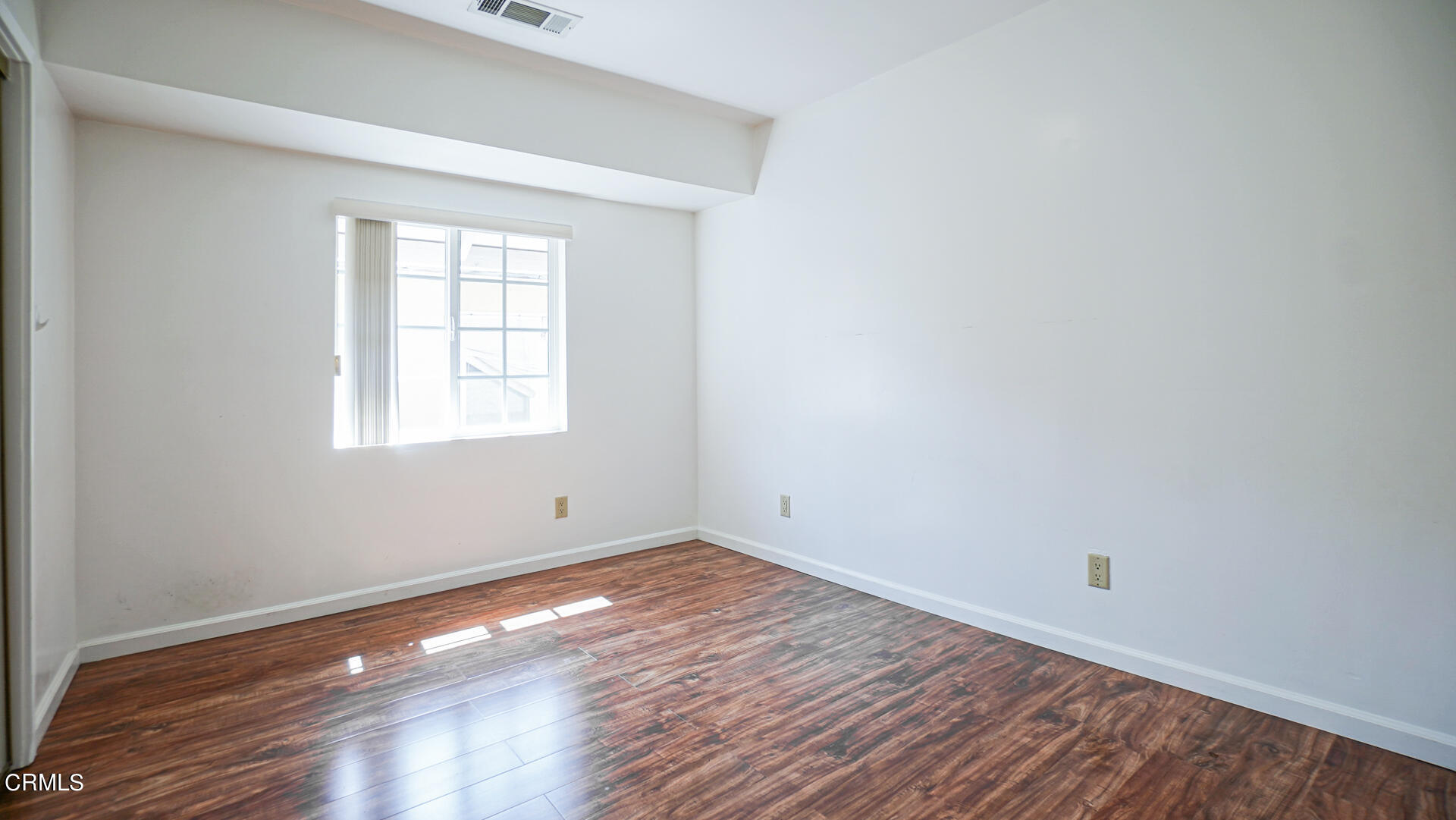 3821 Elma Road Pasadena, CA 91107 - Photo 13 of 27 wooden floor in an empty room with a window