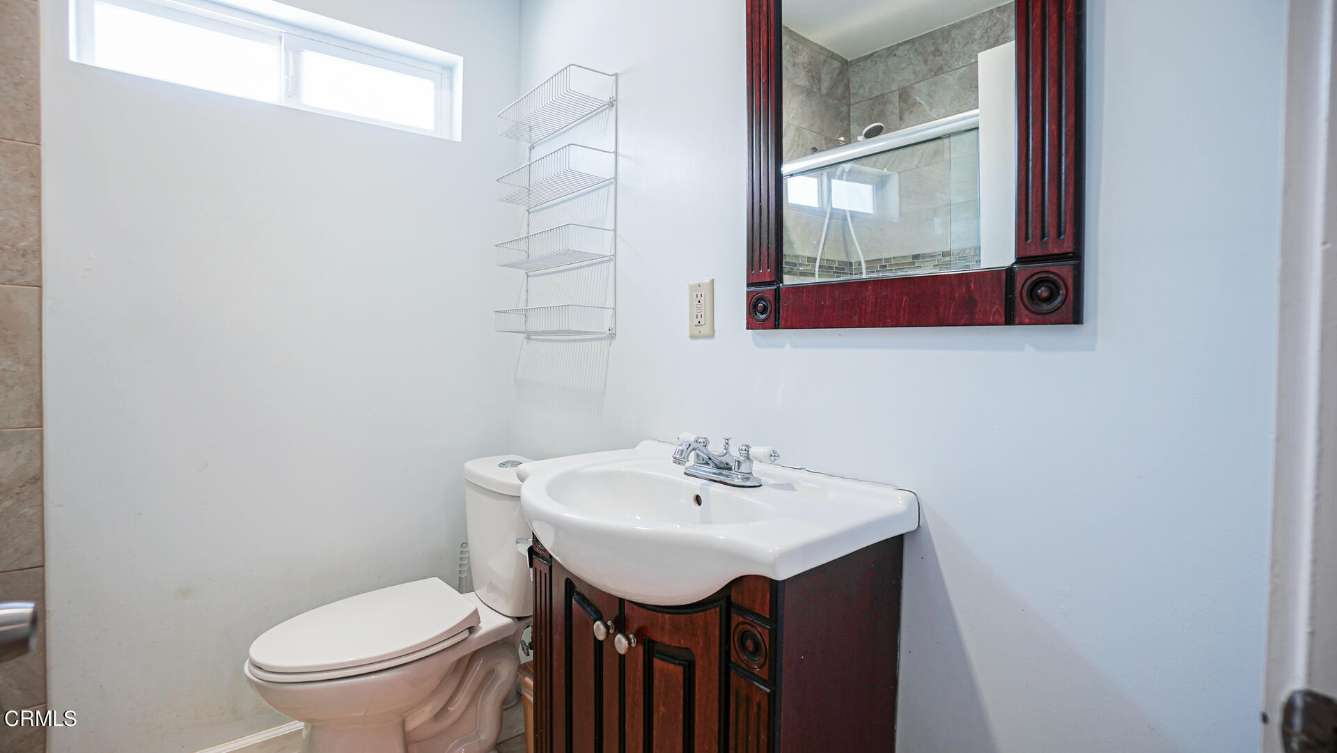 3821 Elma Road Pasadena, CA 91107 - Photo 16 of 27 a bathroom with a sink mirror and toilet