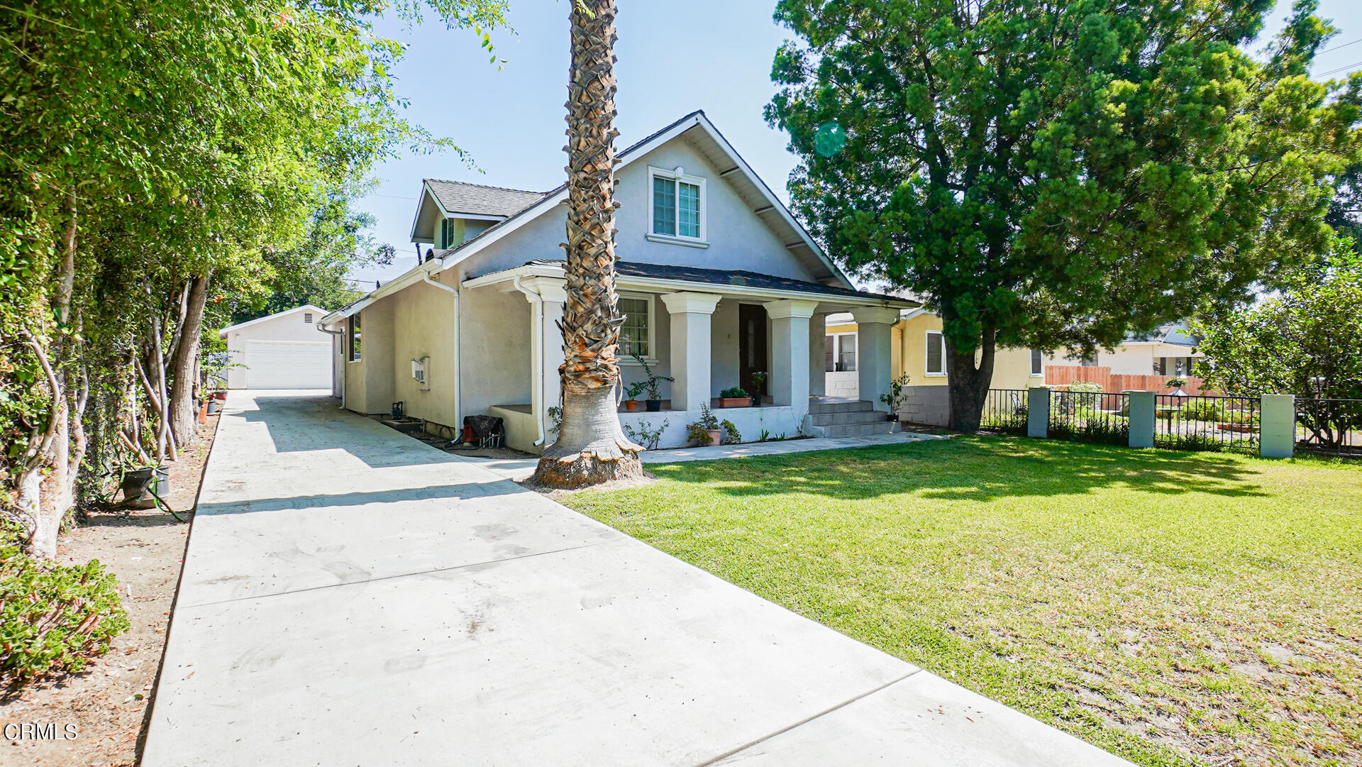 3821 Elma Road Pasadena, CA 91107 - Photo 26 of 27 a front view of house with yard and green space