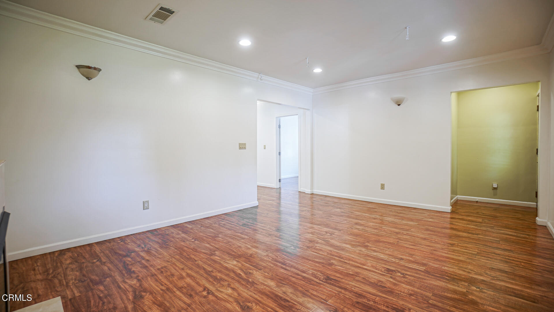 3821 Elma Road Pasadena, CA 91107 - Photo 4 of 27 a view of an empty room with wooden floor