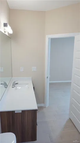 a bathroom with a toilet and a bath tub