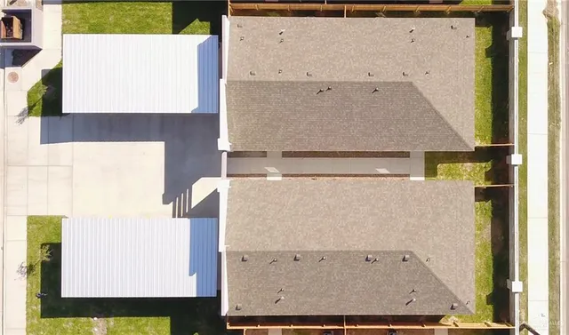 a kitchen with a sink a stove and a microwave