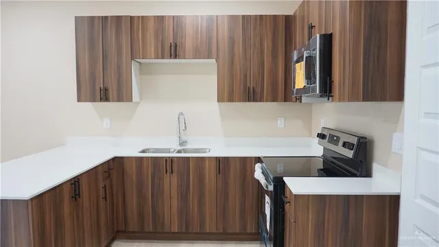 a kitchen with a sink and a cabinets