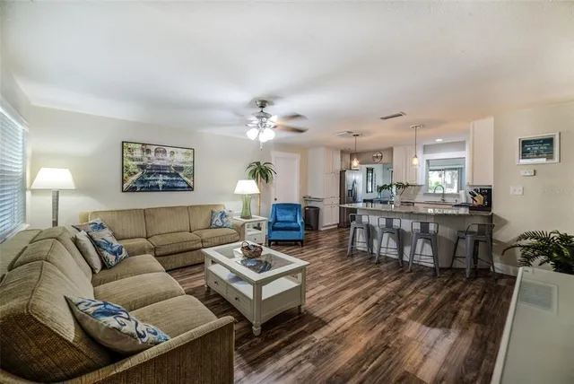 a living room with furniture and a table